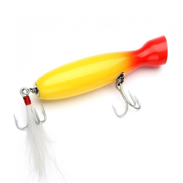 Lure Wobbler Popper on Wood Background with an two hooks. Relax at